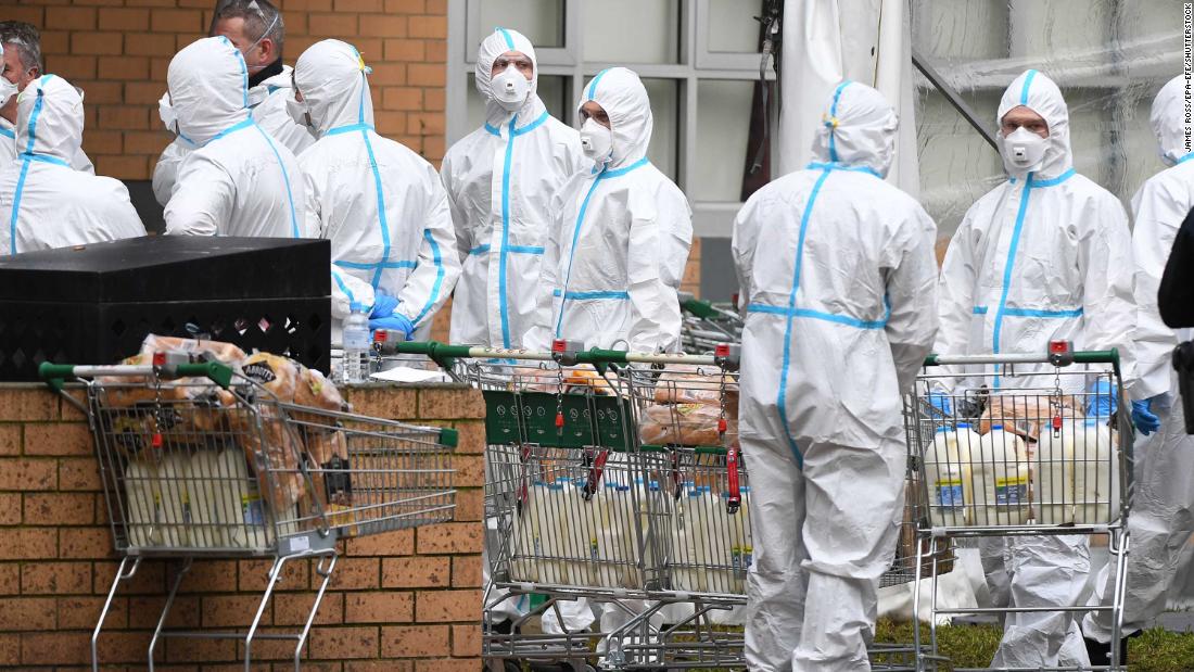 Firefighters dressed in personal protective equipment prepare to distribute food at a public housing tower in North Melbourne, Australia, on Tuesday, July 7. Metropolitan Melbourne was placed under lockdown amid a &lt;a href=&quot;https://www.cnn.com/2020/07/07/asia/melbourne-coronavirus-lockdown-intl-hnk/index.html&quot; target=&quot;_blank&quot;&gt;resurgence of coronavirus cases.&lt;/a&gt;